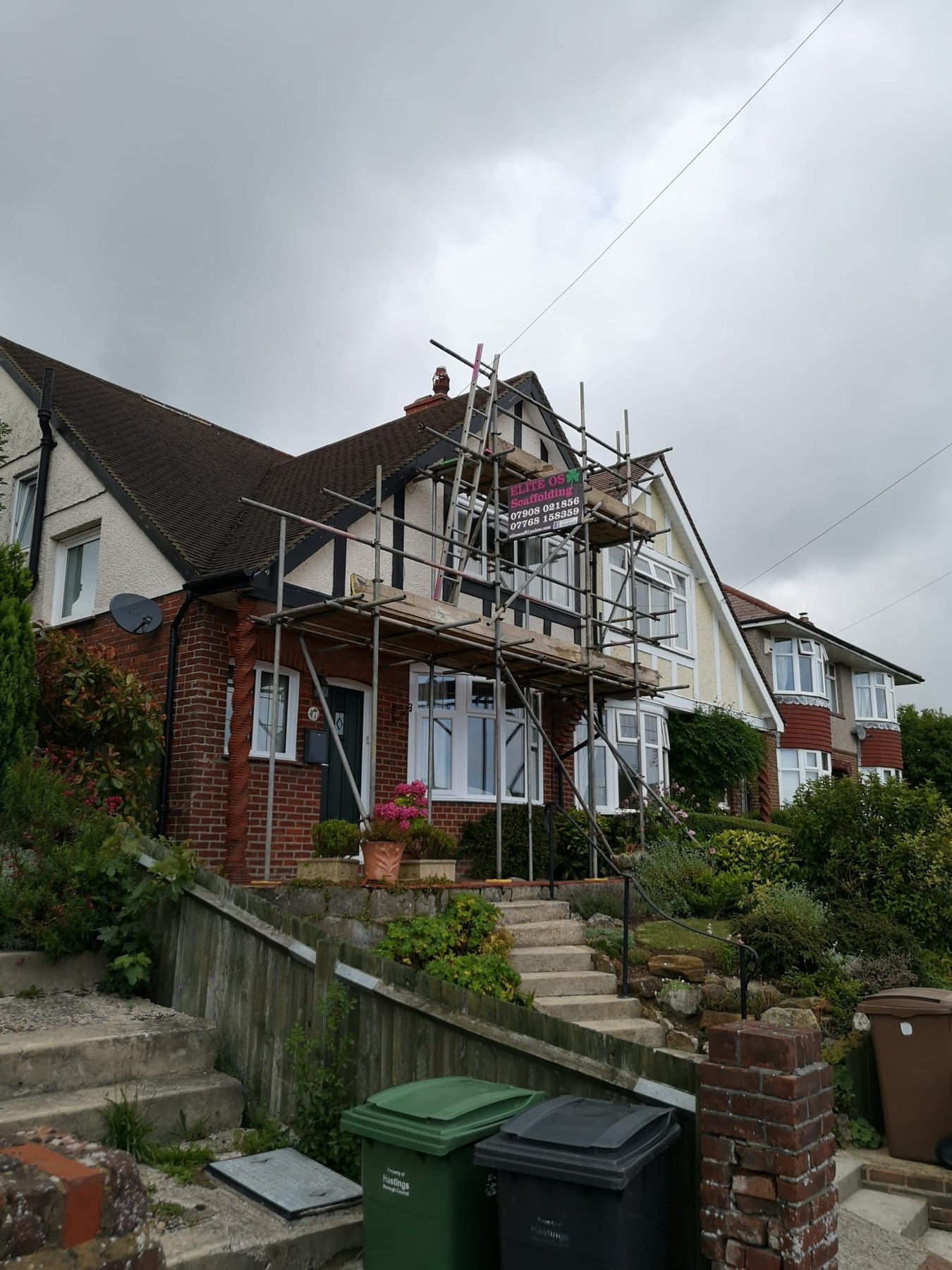 Independent scaffold on a Hastings house, Elite board on the gable