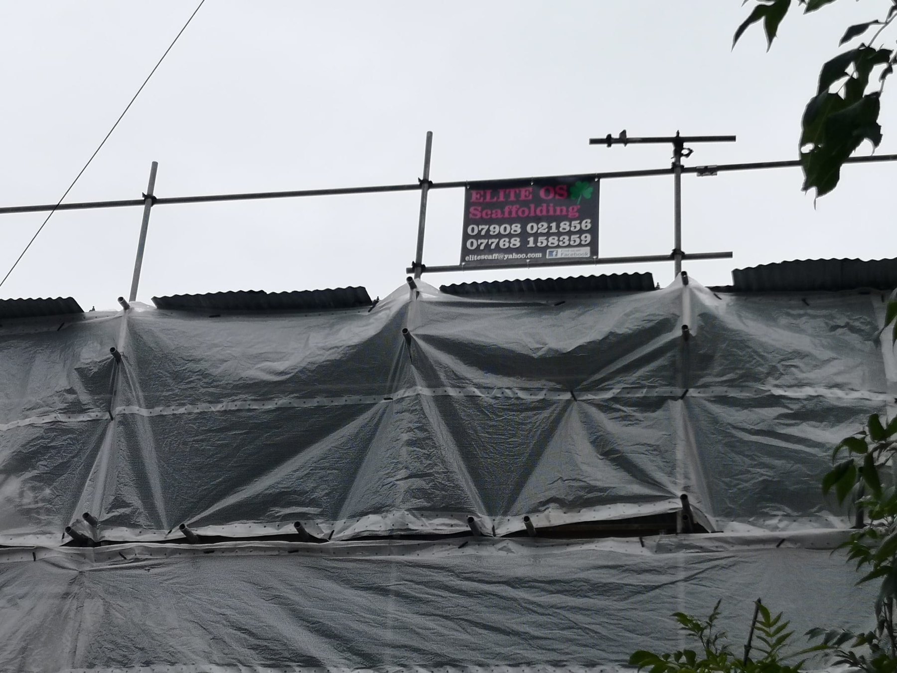 Monarflex temporary roof with an Elite site board on the standards