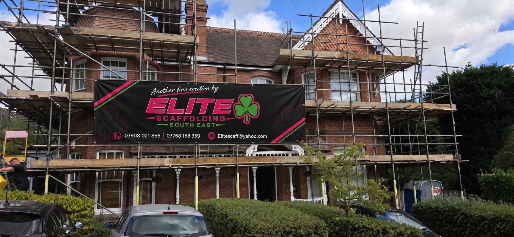 Victorian villa wrapped in scaffold with an Elite Scaffolding South East banner
